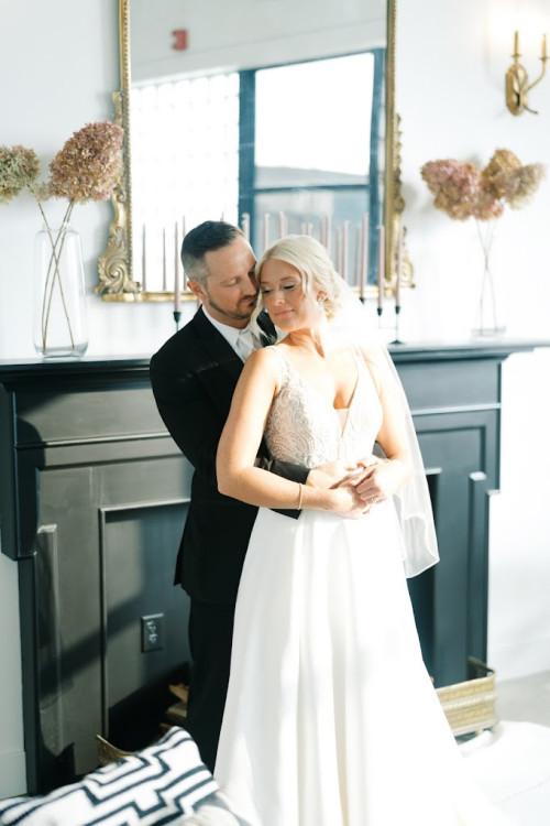 Bride and groom hugging